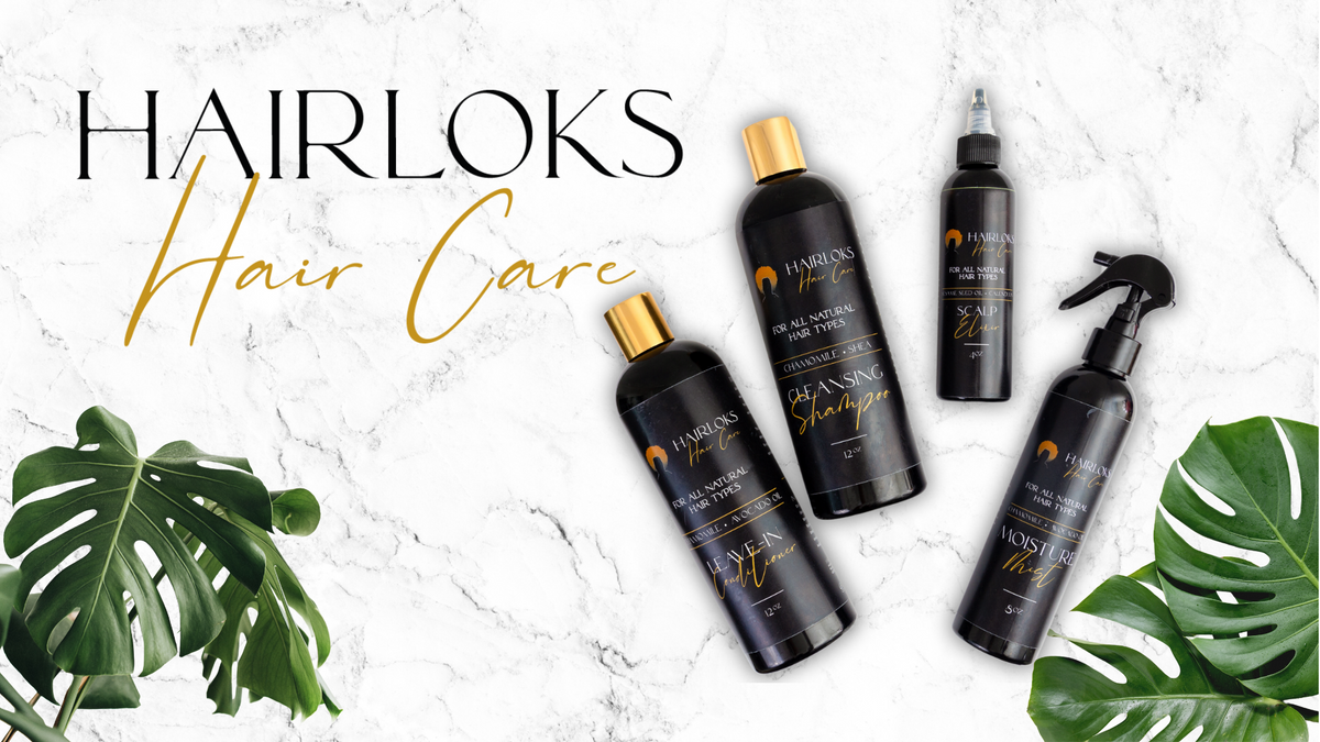 Photo of the complete Hairloks Hair Care line. Four black bottles lay on top of a white marble background with large green leaves in the foreground. 